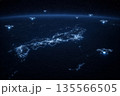 宇宙から見た九州・沖縄の夜景地図（衛星画像風）とドローンのイメージ 135566505
