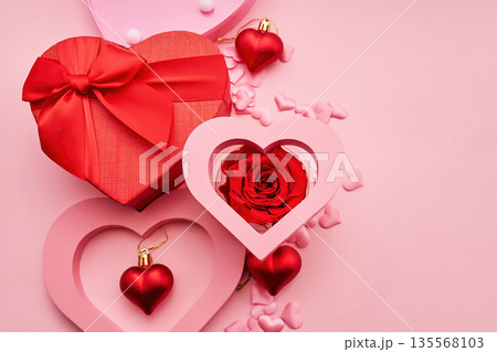 Romantic valentine's day composition with heart shaped gift box and rose Romantic valentine's day composition with heart shaped gift box and rose 135568103