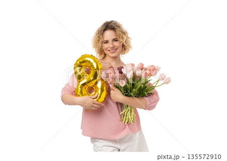 March 8: A woman smiles with flowers and balloons, isolated, PNG 135572910