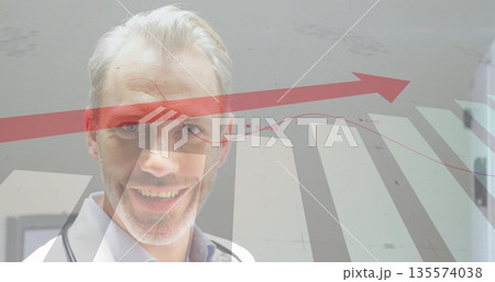 Smiling doctor wearing lab coat and stethoscope in graphic composite, with red arrow and gray bars 135574038