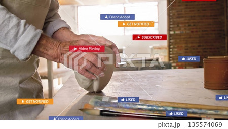 Shaping female artisan molding clay in pottery workshop with brushes, tools and notification badges 135574069