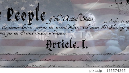Displaying blackletter Article I preamble floating in digital art, showing flag and ink splatters 135574265