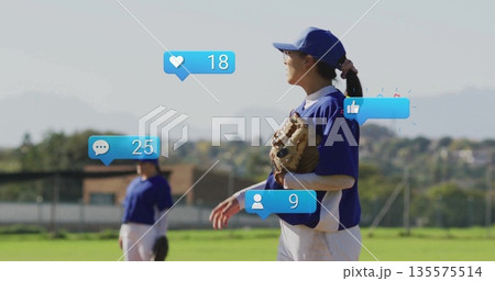Scanning baseball player in blue jersey gripping glove on diamond, with floating reaction icons 135575514
