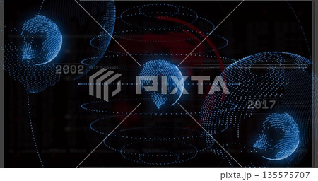 Holographic globe displaying blue dot-matrix on panel, with orbital rings, 2002 or 2017 labels 135575707