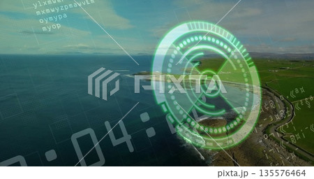 Displaying HUD hovering over coastal headland, with green reticle and code lines, copy space Displaying HUD hovering over coastal headland, with green reticle and code lines, copy space 135576464