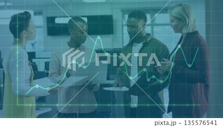 Discussing team reviewing performance metrics in modern office, with laptop reports and data graph Discussing team reviewing performance metrics in modern office, with laptop reports and data graph 135576541