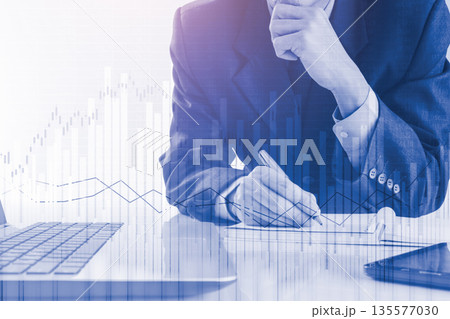 Stock market or forex trading graph and candlestick chart suitable for financial investment concept. Economy trends background for business idea and all art work design. Abstract finance background. Stock market or forex trading graph and candlestick chart suitable for financial investment concept. Economy trends background for business idea and all art work design. Abstract finance background. 135577030