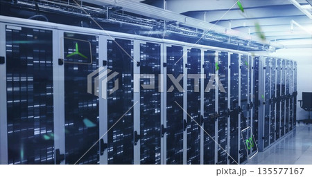 Operating servers housed in cabinets lining data center aisle, with blinking LED indicators Operating servers housed in cabinets lining data center aisle, with blinking LED indicators 135577167
