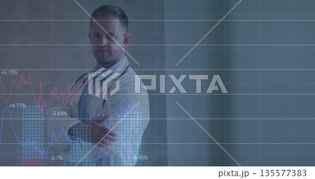 Displaying chart overlay, doctor crossing arms in clinic, with coat and stethoscope, copy space Displaying chart overlay, doctor crossing arms in clinic, with coat and stethoscope, copy space 135577383