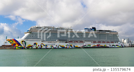 Miami, Florida, USA - November 03, 2024: Norwegian Encore cruise ship voyage. Cruise in summer vacation. Norwegian cruise line. Cruise ship tour and travel at sea. Ship leaving Miami port Miami, Florida, USA - November 03, 2024: Norwegian Encore cruise ship voyage. Cruise in summer vacation. Norwegian cruise line. Cruise ship tour and travel at sea. Ship leaving Miami port 135579674