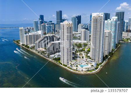 Aerial view of Brickell skyscrapers. Modern cityscape of downtown Miami. Panoramic Miami skyline above the coastline. Aerial view of Brickell skyscrapers. Modern cityscape of downtown Miami. Panoramic Miami skyline above the coastline. 135579707