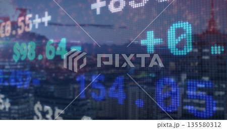 Streaming translucent digital ticker over city skyline at dusk, with floating monetary values 135580312