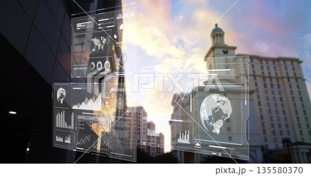 Showing digital UI panels floating over city street at dusk, depicting world maps and charts Showing digital UI panels floating over city street at dusk, depicting world maps and charts 135580370