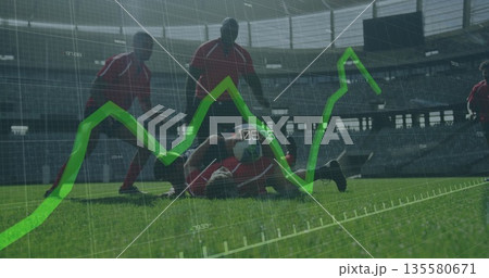Competing six soccer players battling for soccer ball on stadium pitch, with green graph overlay 135580671