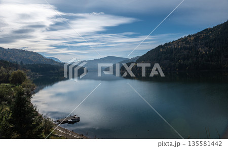 Peaceful Autumn Landscape Of Lake Izvorul Muntelui In Romanian Mountains Peaceful Autumn Landscape Of Lake Izvorul Muntelui In Romanian Mountains 135581442