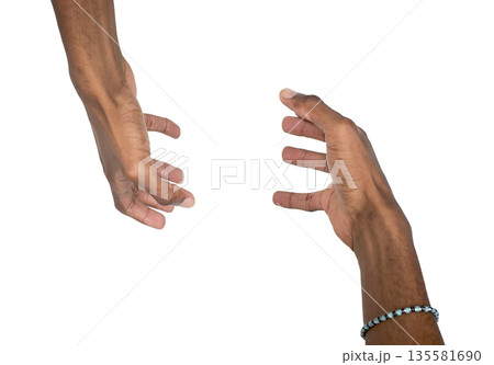 Hands held together in grasping pose with open palms and fingers curved. Black skin male making Hands held together in grasping pose with open palms and fingers curved. Black skin male making 135581690