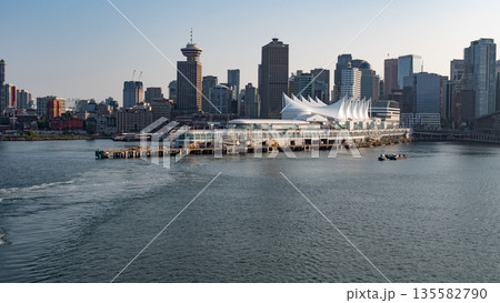 Vancouver, Canada - May 29, 2019: Coal Harbor with architecture building. Downtown cityscape architecture. Architectural city downtown. Canada Place skyline. Vancouver downtown Coal Harbor Vancouver, Canada - May 29, 2019: Coal Harbor with architecture building. Downtown cityscape architecture. Architectural city downtown. Canada Place skyline. Vancouver downtown Coal Harbor 135582790