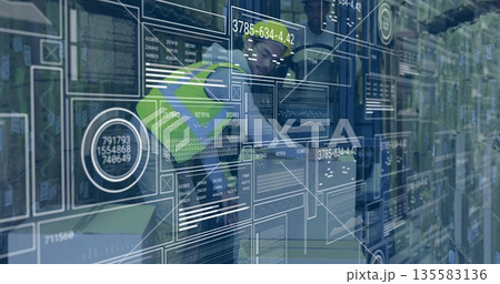 Inspecting inventory, technicians wearing vests using tablet in storage aisle, digital overlay 135583136