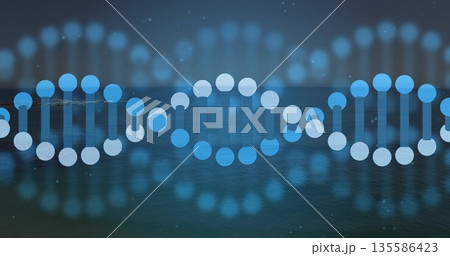 Glowing digital DNA helix pattern floating on teal water surface, with ambient light particles 135586423
