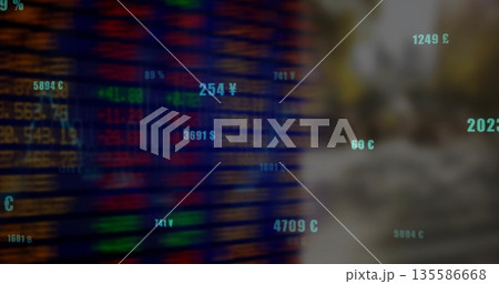 Projecting neon currency symbols and values over stock market ticker board in digital trading scene 135586668
