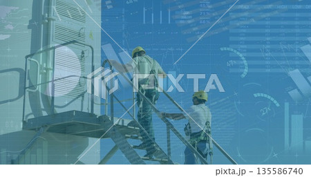 Climbing technicians ascending industrial staircase, wearing safety harnesses and hard hats Climbing technicians ascending industrial staircase, wearing safety harnesses and hard hats 135586740