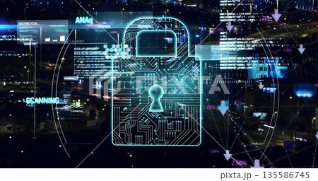 Projecting neon-blue circuit padlock icon scanning highway interchange at night, with data streams 135586745