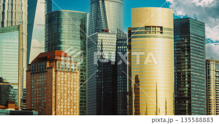Shanghai skyline with modern business buildings, Tower, shopping mall at with clear blue sky and sunlight reflections on glass facades 135588883