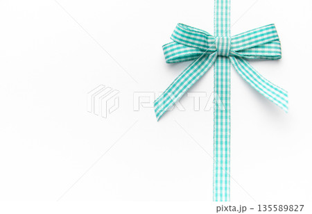 Gingham ribbon bow with copy space Gingham ribbon bow with copy space 135589827