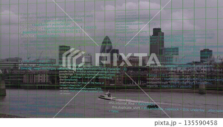 Displaying London skyline above River Thames, with white boat, cargo ship, green grid and code text Displaying London skyline above River Thames, with white boat, cargo ship, green grid and code text 135590458