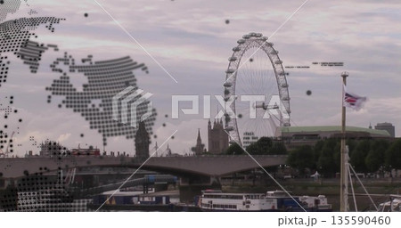 London Eye spinning along Thames, with bridge, map overlay and Union Jack flag, copy space London Eye spinning along Thames, with bridge, map overlay and Union Jack flag, copy space 135590460