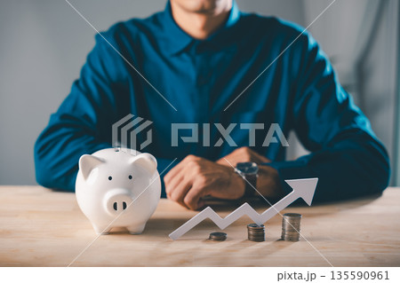 Piggy bank economy increase money wealth gambling pig report saving strategy, businessman manages investments and financial growth using rising white arrow with coin stacks to gain Piggy bank economy increase money wealth gambling pig report saving strategy, businessman manages investments and financial growth using rising white arrow with coin stacks to gain 135590961