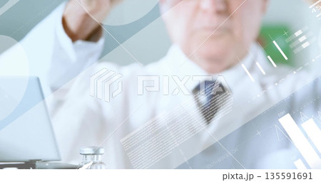 Touching digital panel, doctor wearing lab coat pointing at charts inside lab, with laptop and vial 135591691