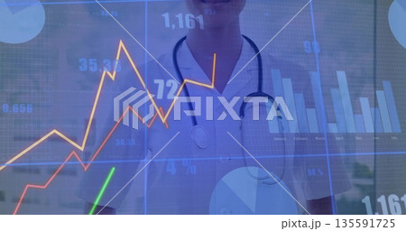 Doctor wearing white top with stethoscope viewing line, bar charts on display in clinic, copy space Doctor wearing white top with stethoscope viewing line, bar charts on display in clinic, copy space 135591725