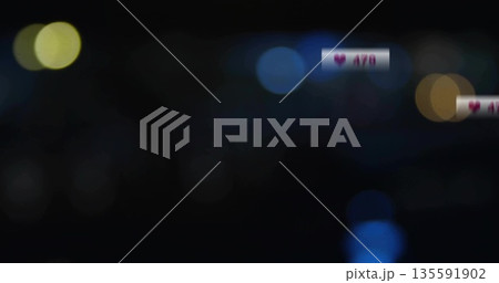Floating notification box displaying heart count over dark abstract bokeh background, copy space 135591902