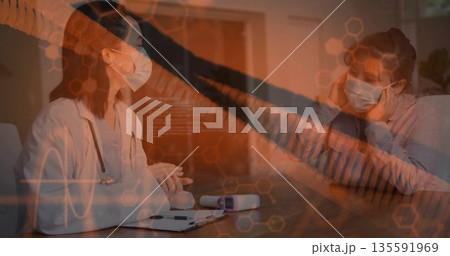 Consulting Korean doctor wearing medical gear at clinic desk with patient holding head and overlays 135591969