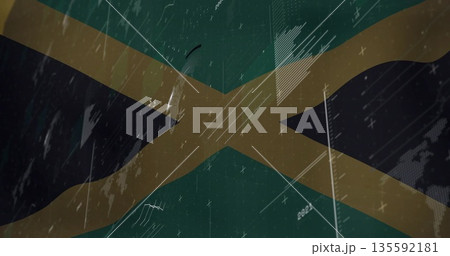 Displaying stylized Jamaican flag graphic flickering in digital environment, with glitch artifacts 135592181