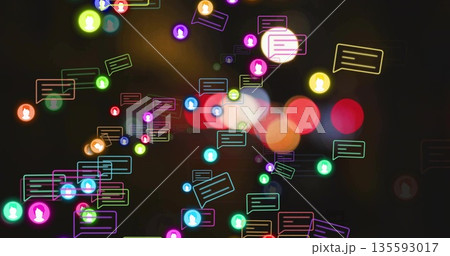 Floating neon speech bubbles with user icons drifting over blurred light circles in digital overlay 135593017