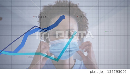 Adjusting female healthcare worker lifting disposable surgical mask straps in studio, data overlay Adjusting female healthcare worker lifting disposable surgical mask straps in studio, data overlay 135593093