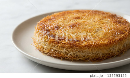 Traditional Turkish Kadayif Dessert On White Plate Traditional Turkish Kadayif Dessert On White Plate 135593123