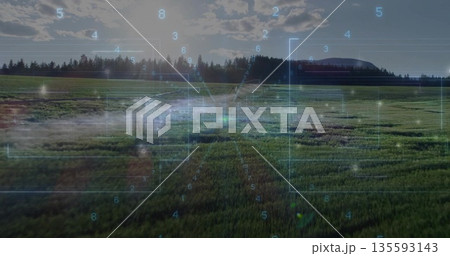Displaying grassland stretching toward conifer forest and distant hill at meadow, with HUD elements Displaying grassland stretching toward conifer forest and distant hill at meadow, with HUD elements 135593143