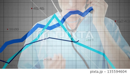 clinician using stethoscope on chest in grid overlay display, with colored line graphs numeric data 135594604