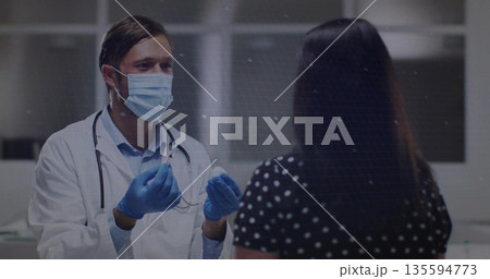 Explaining treatment, male doctor guiding patient in clinic wearing mask and gloves, copy space Explaining treatment, male doctor guiding patient in clinic wearing mask and gloves, copy space 135594773