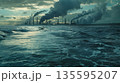 Ocean pollution near industrial factory under dark sky 135595207