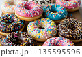 colorful donuts on a black background 135595596