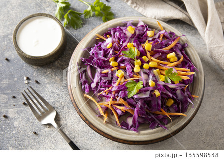Colorful vegetable salad with red cabbage and corn for healthy eating Colorful vegetable salad with red cabbage and corn for healthy eating 135598538