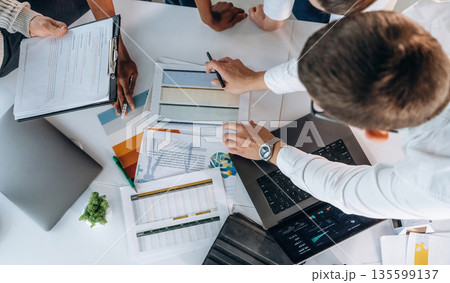 Unity conception. Top view of hands of business people 135599137