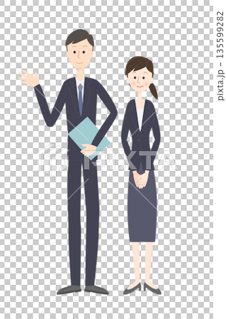 一男一女身著西裝,正在帶人參觀。 一男一女身著西裝,正在帶人參觀。 135599282