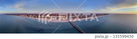 Aerial winter panorama of Groemitz coastline and pier Aerial winter panorama of Groemitz coastline and pier 135599430