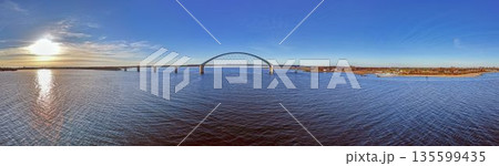 Wide panoramic view of Fehmarnbelt bridge across Baltic Sea Wide panoramic view of Fehmarnbelt bridge across Baltic Sea 135599435