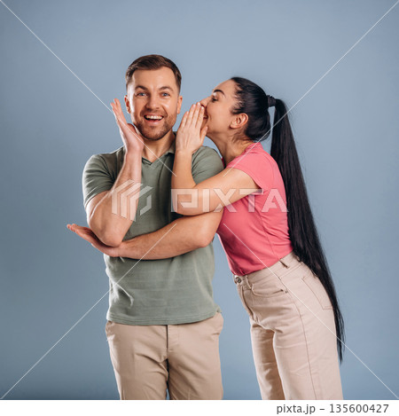 Gossip time, funny couple. Man and woman are in the studio Gossip time, funny couple. Man and woman are in the studio 135600427